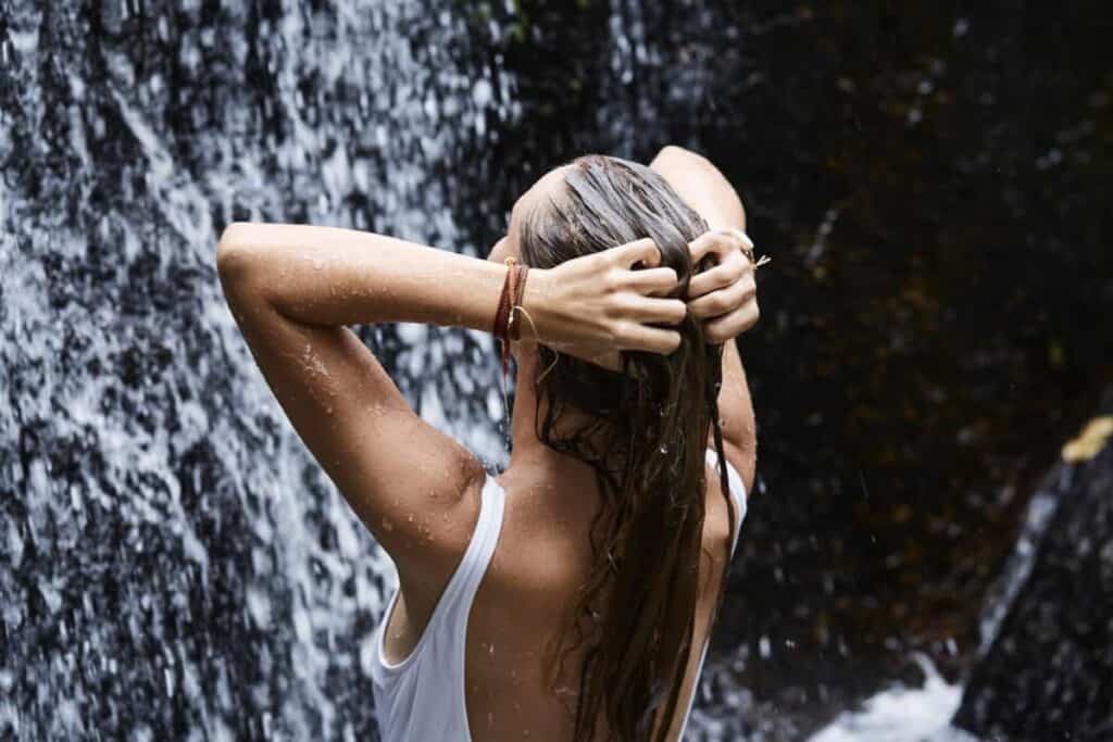 Washing hair outside slow motion pic