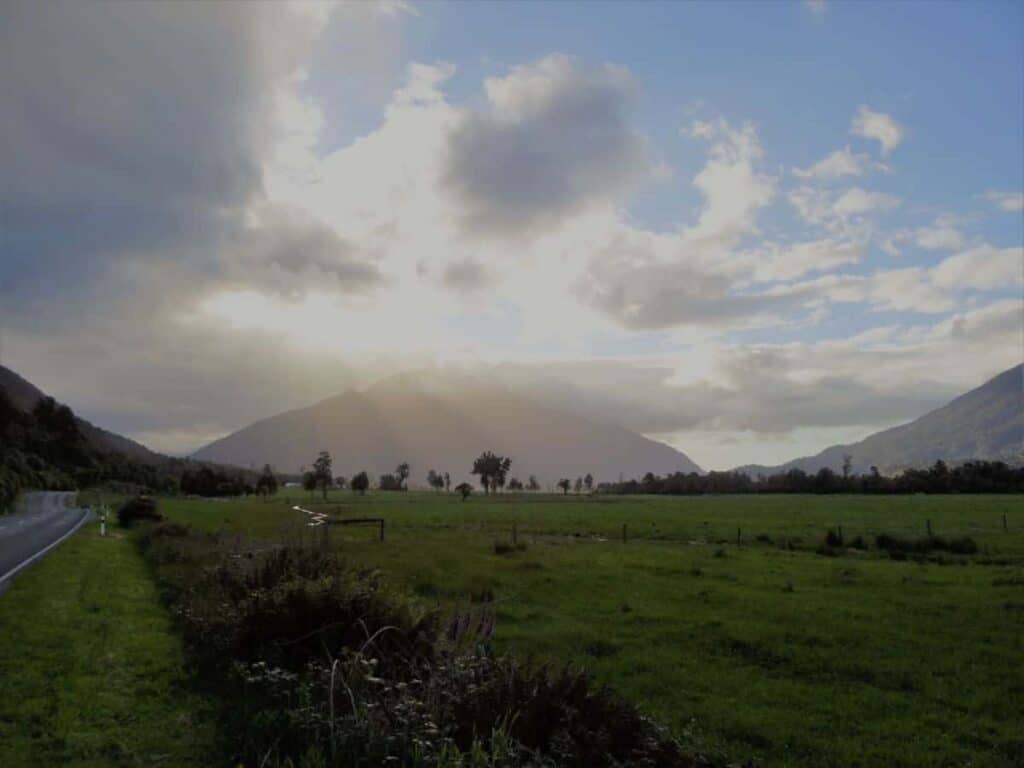 roadside-picture-arthur's-pass-sunlight-filtering-through-clouds