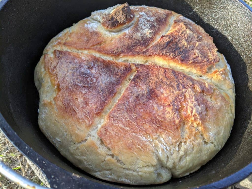 Browned and Delicious Sourdough bread inside a Dutch oven