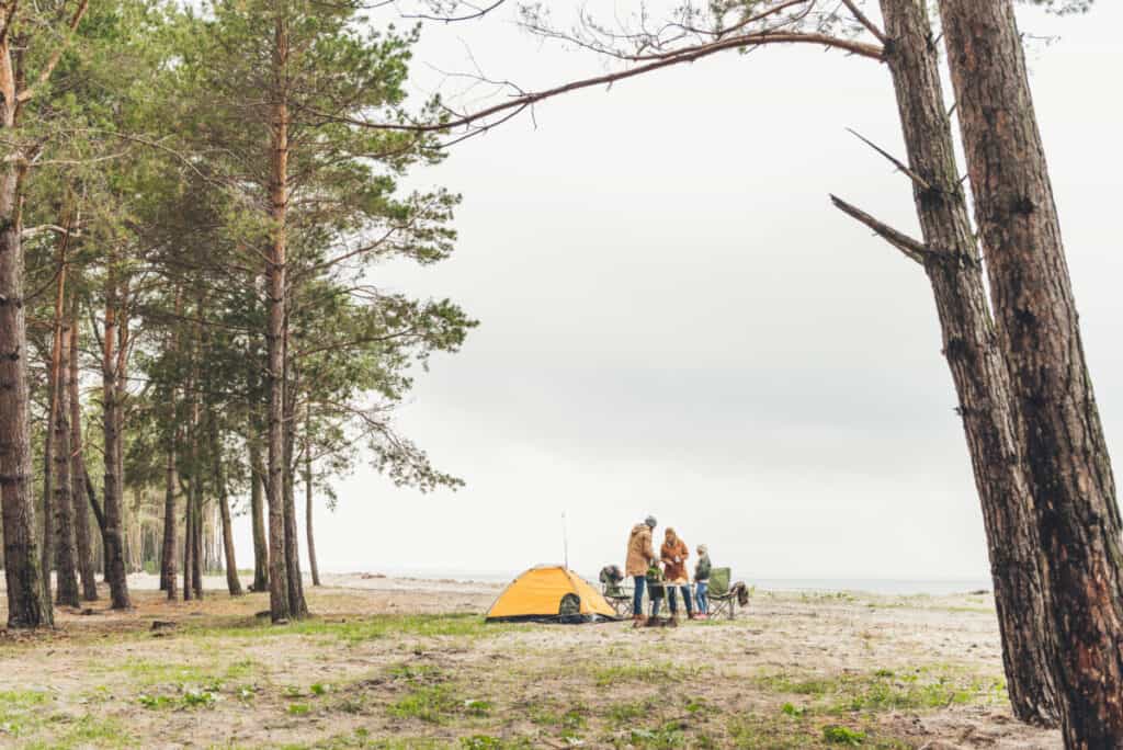 family-at-beach-winter-camping