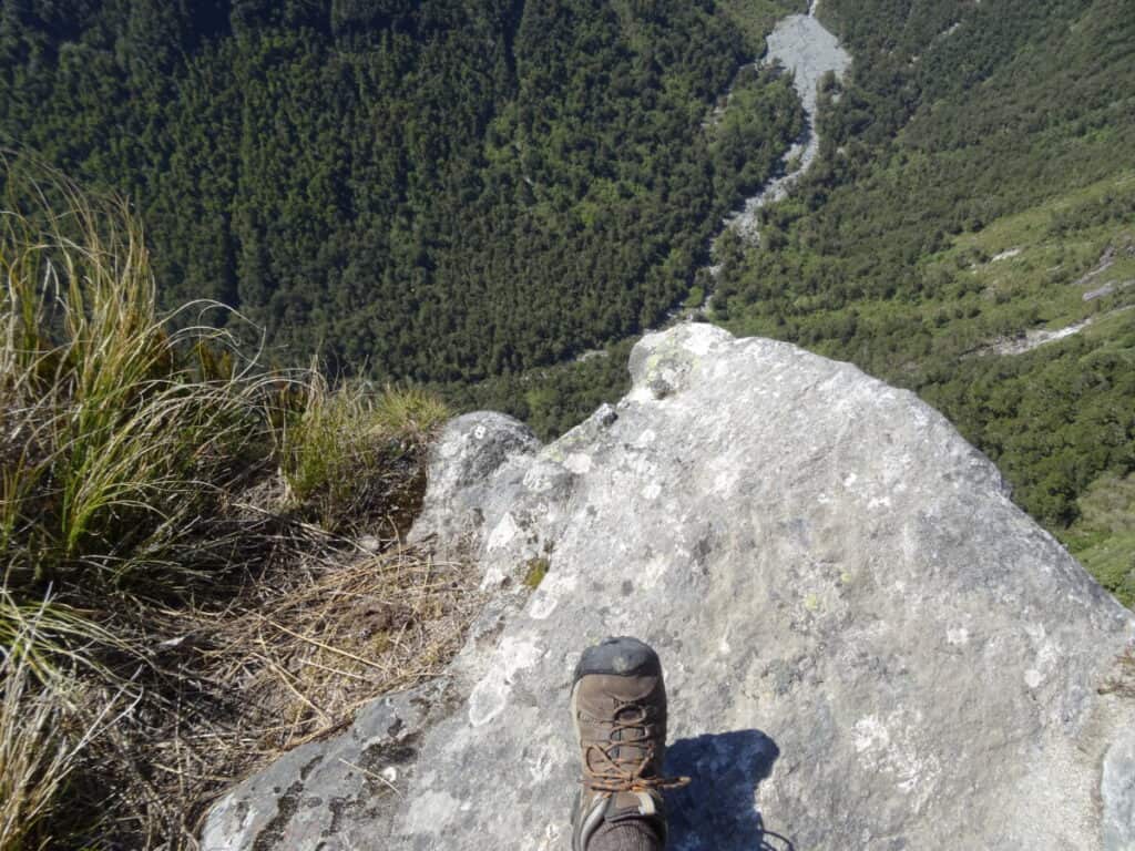 me-wearing-voyaguer-keen-shoe looking-off-edge-of-cliff-first-person-perspective