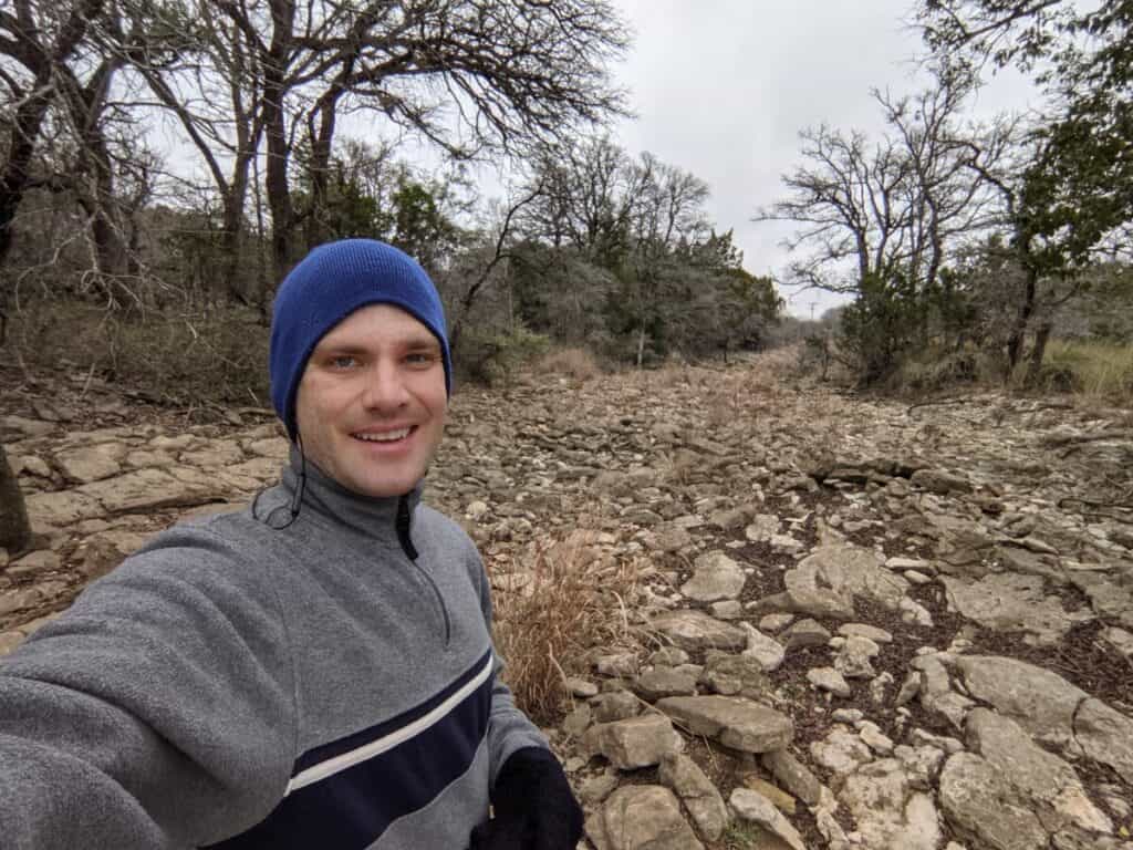 me-standing-in-dry-river-bed-with-my-running-gear