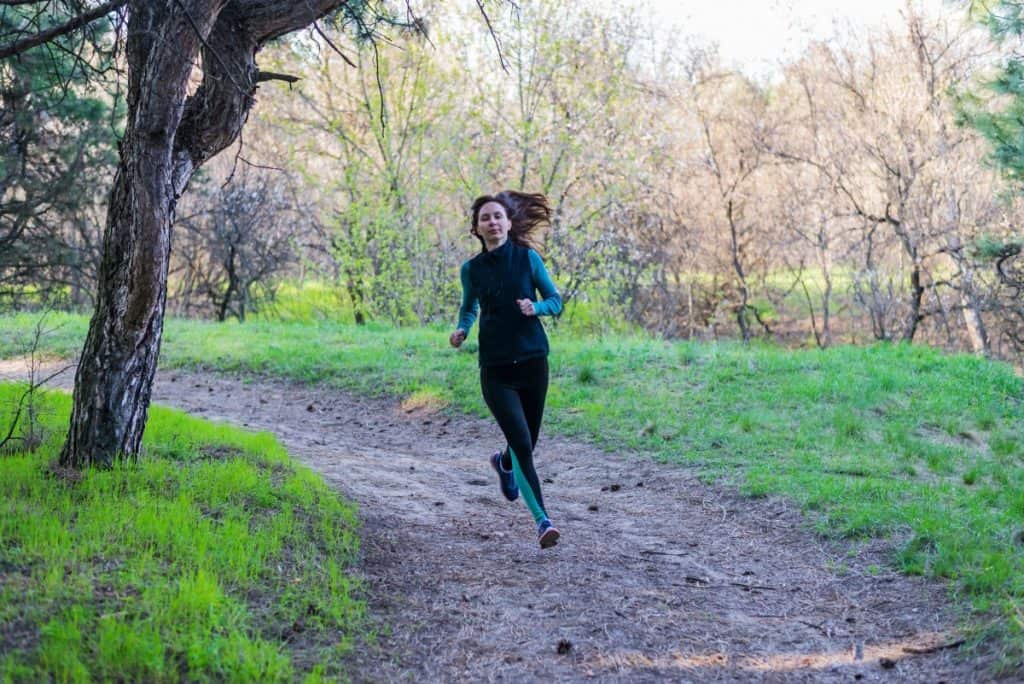 woman-running-in-woods
