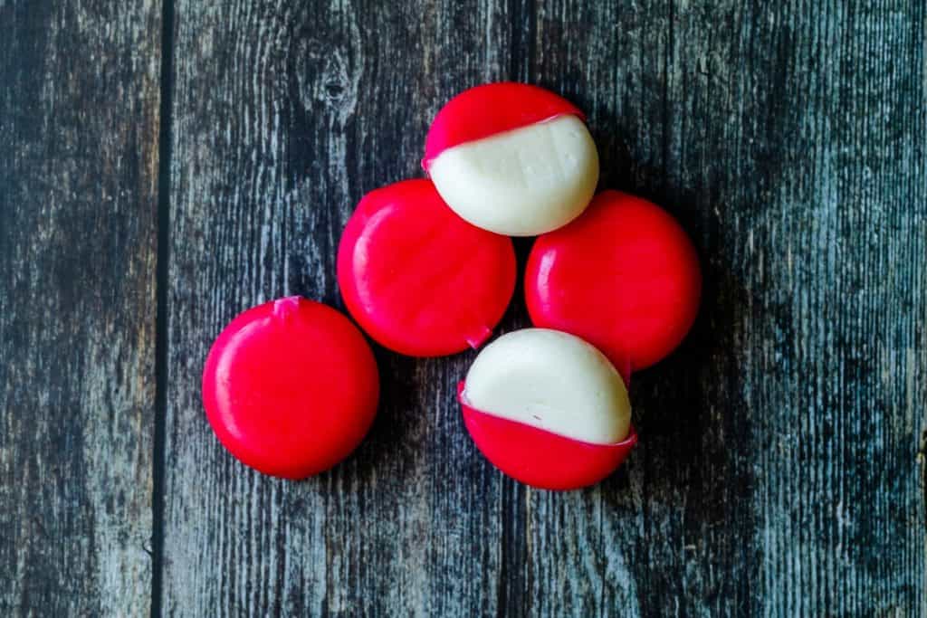 babybel cheese on a table