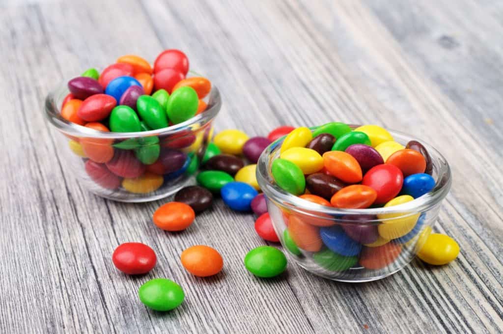 bowls of coated chocolate candy