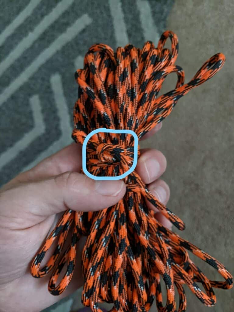 coiled rope with a circled square knot